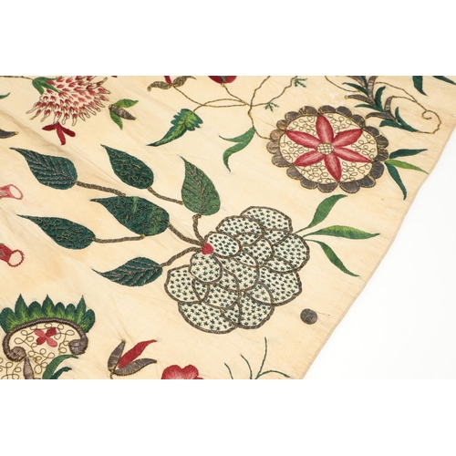 576 - 18THC SILK EMBROIDERED FLORAL PANEL. A small piece of 18thc embroidered silk which may have been par... 