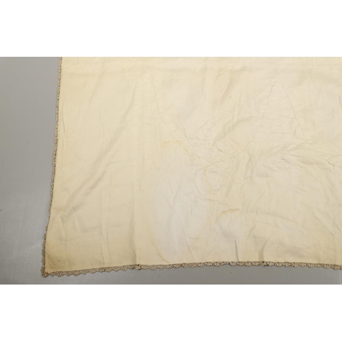 578 - VINTAGE IVORY SATIN BED COVER & OTHER TEXTILES. A late 19thc/early 20thc ivory coloured satin bed co... 