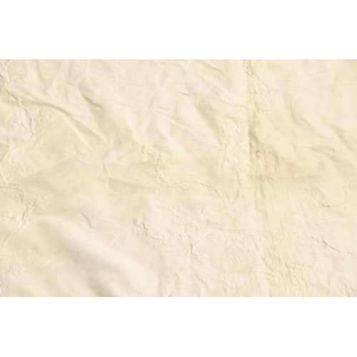 578 - VINTAGE IVORY SATIN BED COVER & OTHER TEXTILES. A late 19thc/early 20thc ivory coloured satin bed co... 