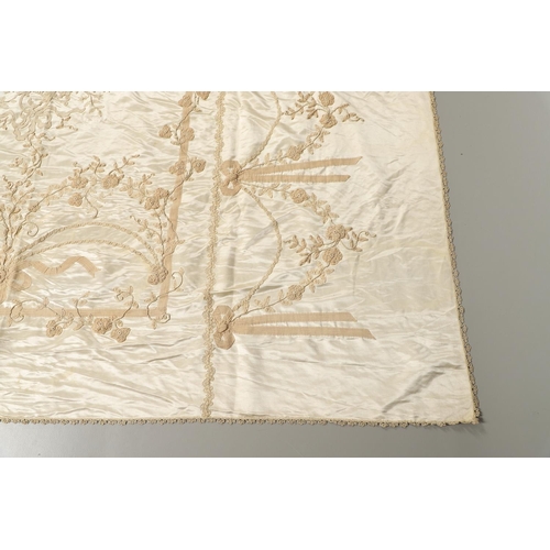 578 - VINTAGE IVORY SATIN BED COVER & OTHER TEXTILES. A late 19thc/early 20thc ivory coloured satin bed co... 