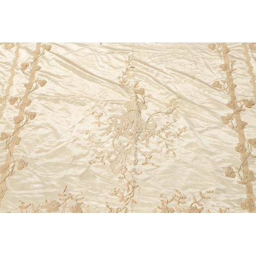 578 - VINTAGE IVORY SATIN BED COVER & OTHER TEXTILES. A late 19thc/early 20thc ivory coloured satin bed co... 