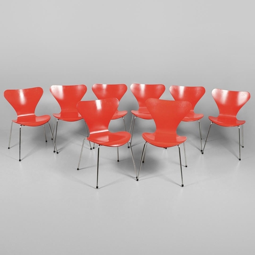 583 - FRITZ HANSEN - DANISH DESIGNER STACKING CHAIRS. A set of eight Series 7 red laminate wooden chairs w... 