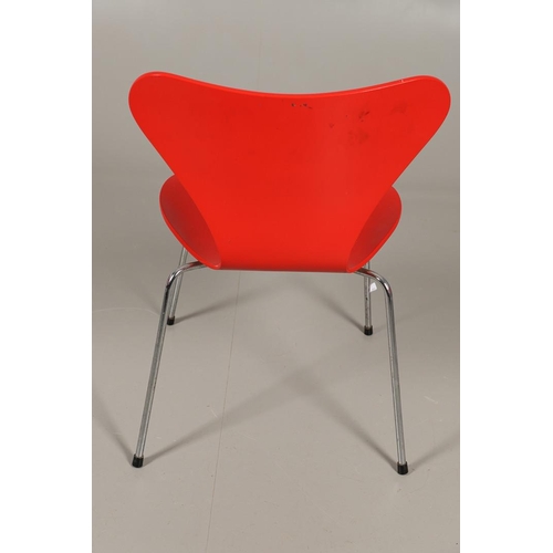 583 - FRITZ HANSEN - DANISH DESIGNER STACKING CHAIRS. A set of eight Series 7 red laminate wooden chairs w... 