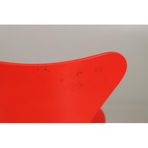 583 - FRITZ HANSEN - DANISH DESIGNER STACKING CHAIRS. A set of eight Series 7 red laminate wooden chairs w... 