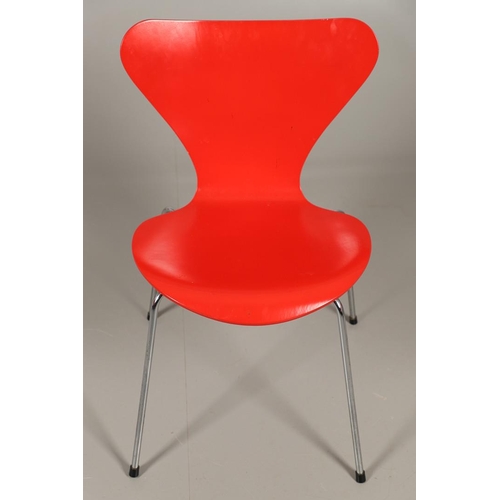 583 - FRITZ HANSEN - DANISH DESIGNER STACKING CHAIRS. A set of eight Series 7 red laminate wooden chairs w... 