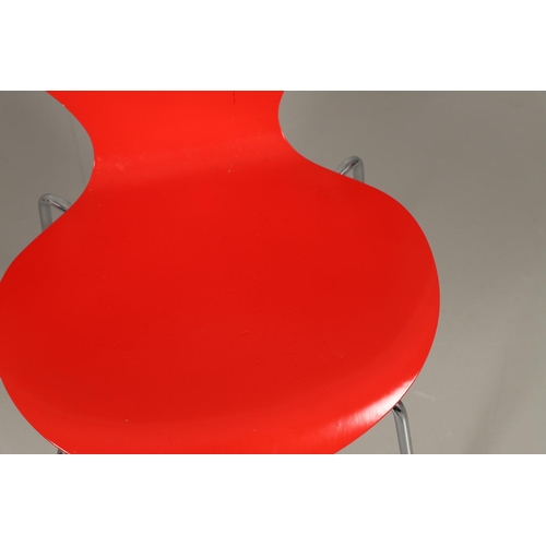 583 - FRITZ HANSEN - DANISH DESIGNER STACKING CHAIRS. A set of eight Series 7 red laminate wooden chairs w... 