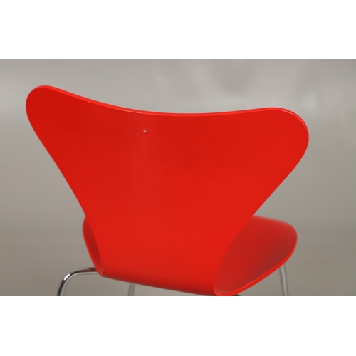 583 - FRITZ HANSEN - DANISH DESIGNER STACKING CHAIRS. A set of eight Series 7 red laminate wooden chairs w... 