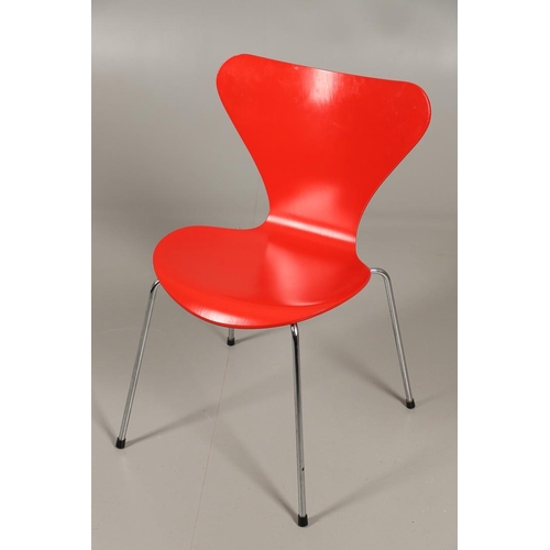 583 - FRITZ HANSEN - DANISH DESIGNER STACKING CHAIRS. A set of eight Series 7 red laminate wooden chairs w... 