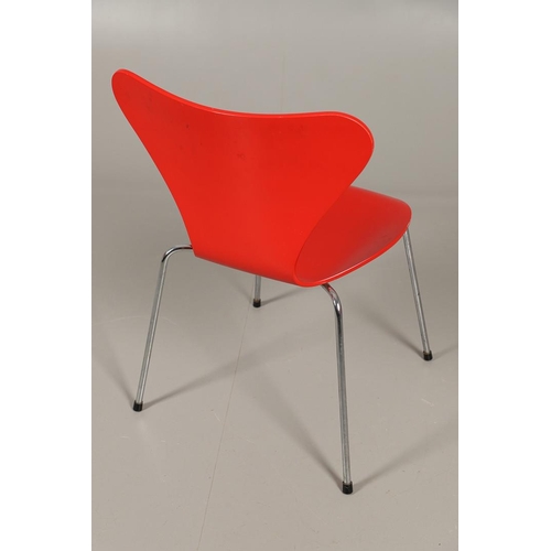 583 - FRITZ HANSEN - DANISH DESIGNER STACKING CHAIRS. A set of eight Series 7 red laminate wooden chairs w... 