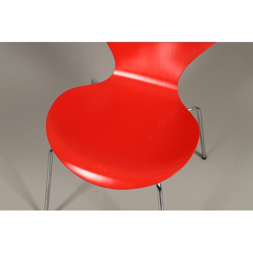 583 - FRITZ HANSEN - DANISH DESIGNER STACKING CHAIRS. A set of eight Series 7 red laminate wooden chairs w... 