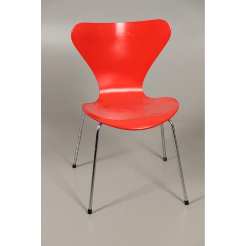 583 - FRITZ HANSEN - DANISH DESIGNER STACKING CHAIRS. A set of eight Series 7 red laminate wooden chairs w... 