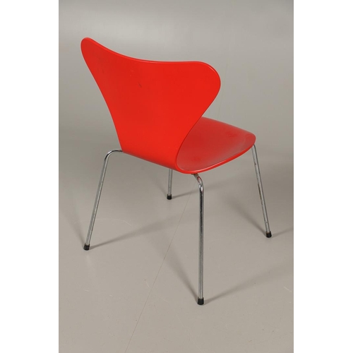 583 - FRITZ HANSEN - DANISH DESIGNER STACKING CHAIRS. A set of eight Series 7 red laminate wooden chairs w... 