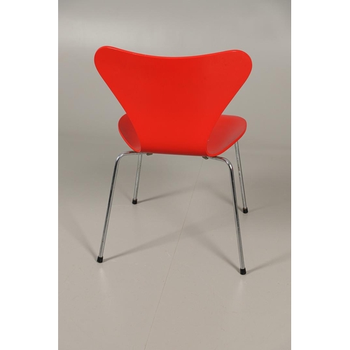 583 - FRITZ HANSEN - DANISH DESIGNER STACKING CHAIRS. A set of eight Series 7 red laminate wooden chairs w... 