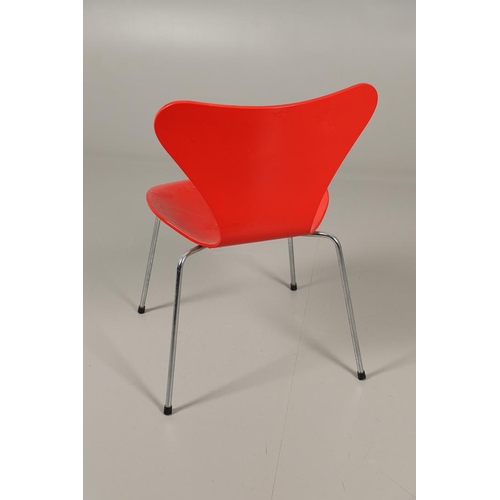 583 - FRITZ HANSEN - DANISH DESIGNER STACKING CHAIRS. A set of eight Series 7 red laminate wooden chairs w... 