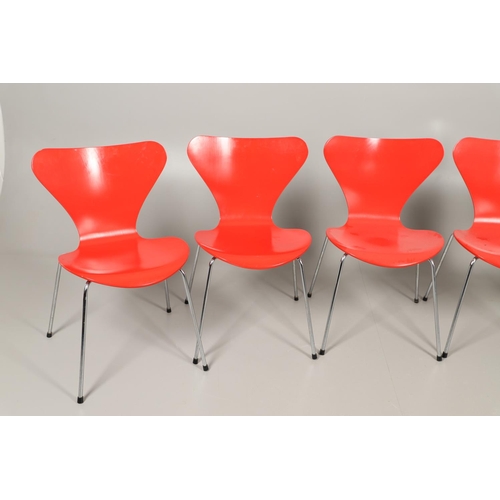 583 - FRITZ HANSEN - DANISH DESIGNER STACKING CHAIRS. A set of eight Series 7 red laminate wooden chairs w... 