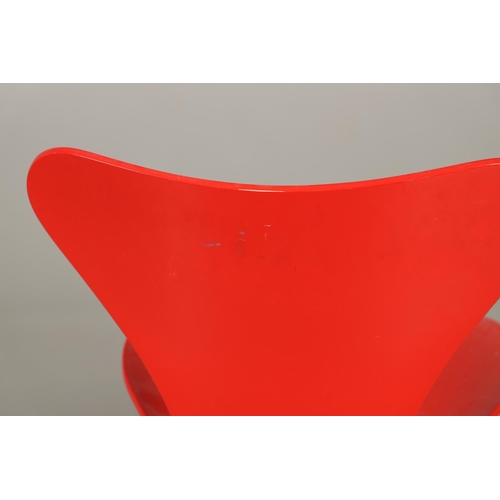 583 - FRITZ HANSEN - DANISH DESIGNER STACKING CHAIRS. A set of eight Series 7 red laminate wooden chairs w... 