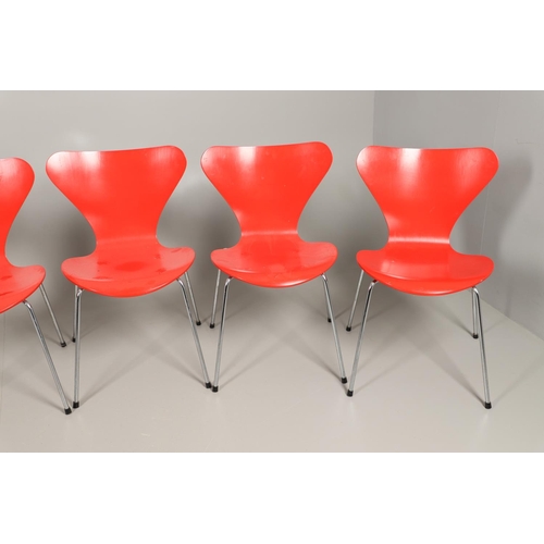 583 - FRITZ HANSEN - DANISH DESIGNER STACKING CHAIRS. A set of eight Series 7 red laminate wooden chairs w... 