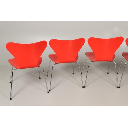 583 - FRITZ HANSEN - DANISH DESIGNER STACKING CHAIRS. A set of eight Series 7 red laminate wooden chairs w... 