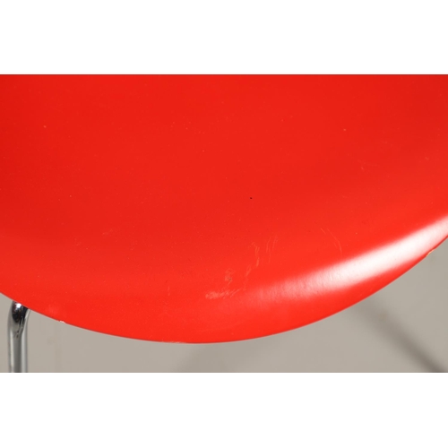 583 - FRITZ HANSEN - DANISH DESIGNER STACKING CHAIRS. A set of eight Series 7 red laminate wooden chairs w... 