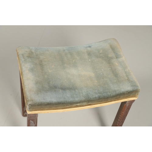 585 - GEORGE VI CORONATION STOOL. A George VI limed oak Coronation stool with blue velvet upholstery. Stam... 