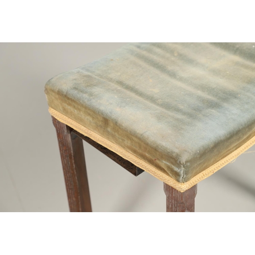 585 - GEORGE VI CORONATION STOOL. A George VI limed oak Coronation stool with blue velvet upholstery. Stam... 