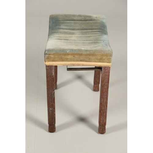 585 - GEORGE VI CORONATION STOOL. A George VI limed oak Coronation stool with blue velvet upholstery. Stam... 