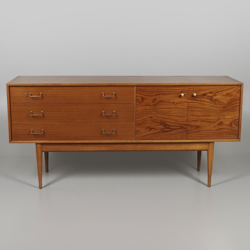 588 - MID CENTURY SIDEBOARD - UNIFLEX. A circa 1960's teak and afromosia sideboard, with three long drawer... 