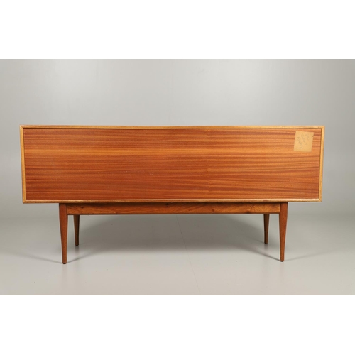 588 - MID CENTURY SIDEBOARD - UNIFLEX. A circa 1960's teak and afromosia sideboard, with three long drawer... 