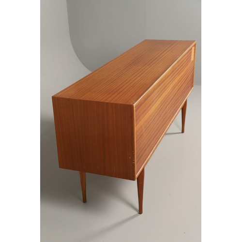 588 - MID CENTURY SIDEBOARD - UNIFLEX. A circa 1960's teak and afromosia sideboard, with three long drawer... 