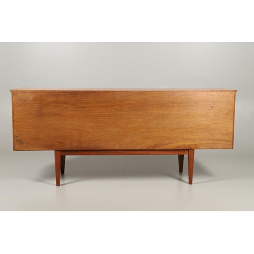 590 - MID CENTURY TEAK SIDEBOARD. Possibly by G Plan, with a large two door cupboard with internal shelf, ... 