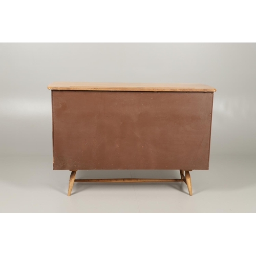 593 - EARLY ERCOL SIDEBOARD. Model number 351, a light elm and beech sideboard, with a long drawer and sho... 