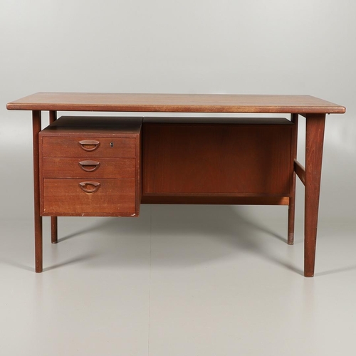 595 - DANISH MID CENTURY DESK - KAI KRISTIANSEN. A teak desk with a 'floating' top, supported on tapering ... 