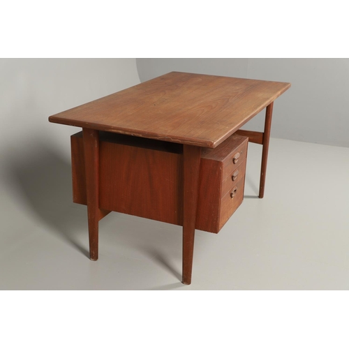 595 - DANISH MID CENTURY DESK - KAI KRISTIANSEN. A teak desk with a 'floating' top, supported on tapering ... 