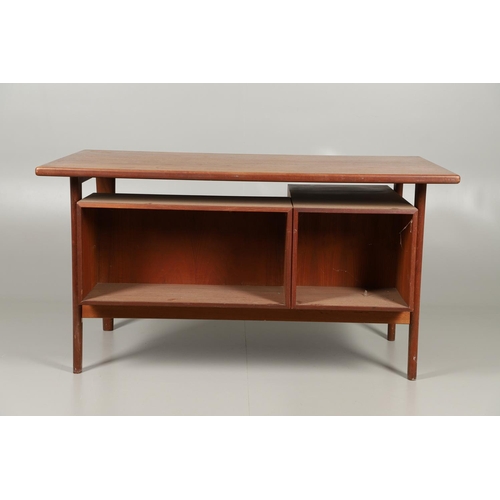 595 - DANISH MID CENTURY DESK - KAI KRISTIANSEN. A teak desk with a 'floating' top, supported on tapering ... 