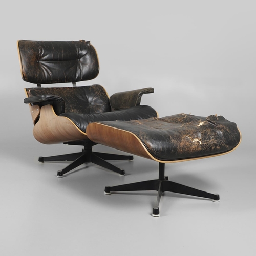 597 - CHARLES & RAY EAMES, LOUNGE CHAIR & OTTOMAN. Nos. 670 and 671, the wooden laminate shells covered wi... 