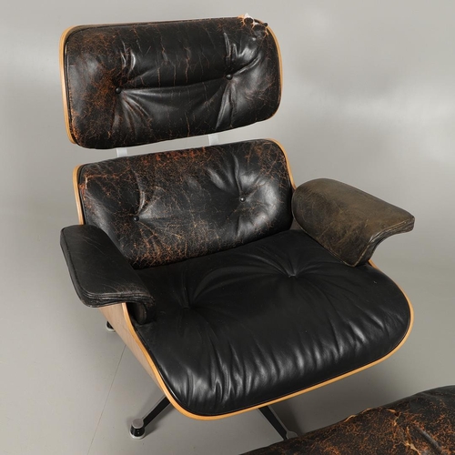 597 - CHARLES & RAY EAMES, LOUNGE CHAIR & OTTOMAN. Nos. 670 and 671, the wooden laminate shells covered wi... 