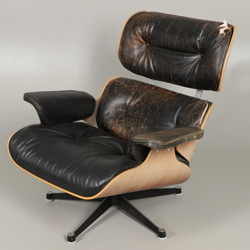 597 - CHARLES & RAY EAMES, LOUNGE CHAIR & OTTOMAN. Nos. 670 and 671, the wooden laminate shells covered wi... 