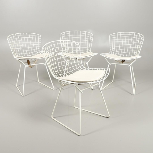 601 - HARRY BERTOIA - SET OF FOUR DESIGNER WIRE WORK CHAIRS. A set of four mid 20thc wire work chairs with... 