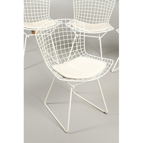 601 - HARRY BERTOIA - SET OF FOUR DESIGNER WIRE WORK CHAIRS. A set of four mid 20thc wire work chairs with... 