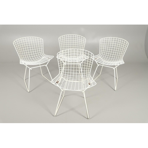 601 - HARRY BERTOIA - SET OF FOUR DESIGNER WIRE WORK CHAIRS. A set of four mid 20thc wire work chairs with... 