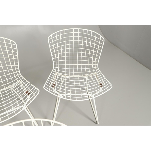 601 - HARRY BERTOIA - SET OF FOUR DESIGNER WIRE WORK CHAIRS. A set of four mid 20thc wire work chairs with... 