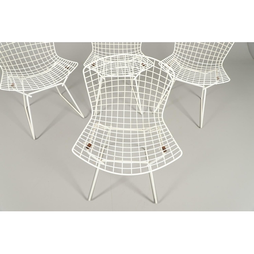 601 - HARRY BERTOIA - SET OF FOUR DESIGNER WIRE WORK CHAIRS. A set of four mid 20thc wire work chairs with... 