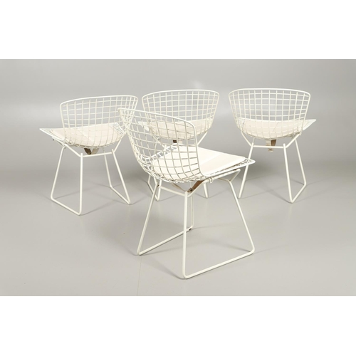 601 - HARRY BERTOIA - SET OF FOUR DESIGNER WIRE WORK CHAIRS. A set of four mid 20thc wire work chairs with... 