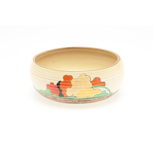 608 - CLARICE CLIFF ART DECO BOWL. A circular bowl painted with a cottage by a bridge and within a landsca... 