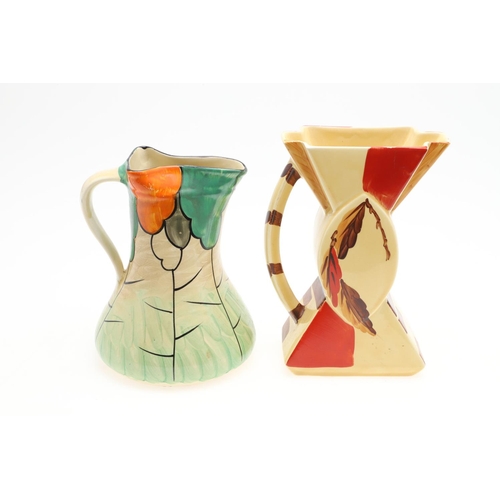 611 - MYOTT 'BOW TIE' ART DECO JUGS. Including three 'Bow Tie' jugs, each hand painted with a variety of f... 