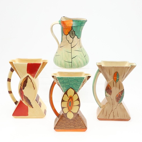 611 - MYOTT 'BOW TIE' ART DECO JUGS. Including three 'Bow Tie' jugs, each hand painted with a variety of f... 