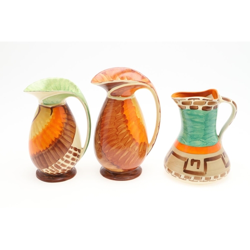 613 - MYOTT ART DECO JUGS. A variety of Myott jugs, each hand painted including three with curved handles ... 