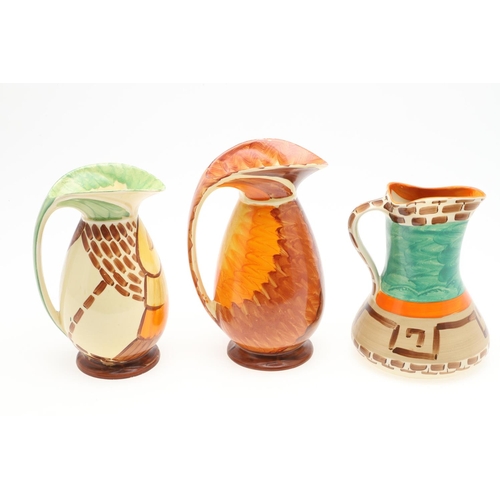 613 - MYOTT ART DECO JUGS. A variety of Myott jugs, each hand painted including three with curved handles ... 