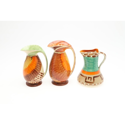 613 - MYOTT ART DECO JUGS. A variety of Myott jugs, each hand painted including three with curved handles ... 