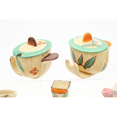 615 - MYOTT ART DECO POTTERY ITEMS. A mixed lot including two unusual lidded preserve pots (BG25, and BG19... 